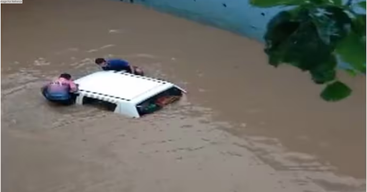 Gujarat: Car submerged at flooded Navsari underpass, occupants rescued